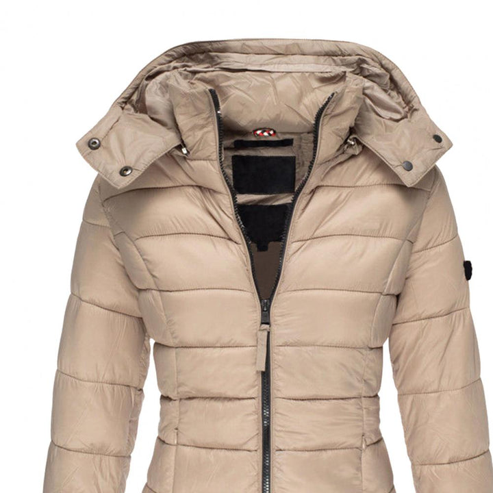 Lange MylenesJacket trenchcoat voor dames met capuchon. Weerbestendig, comfortabel en modieus.