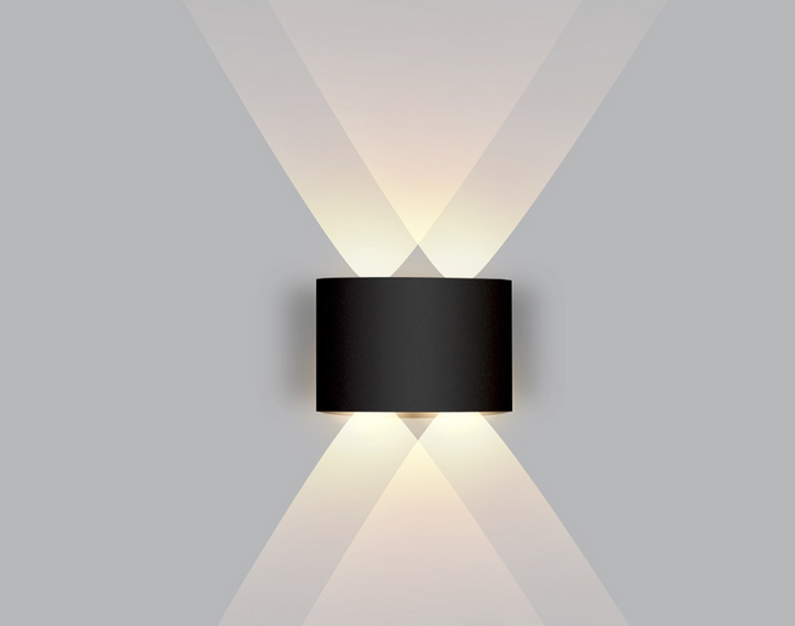 Decoratieve LED wandlamp voor de woonkamer. Zorgt voor warme en uitnodigende sfeerverlichting.