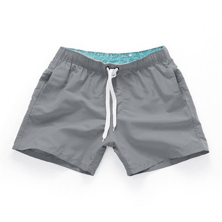 Zomerse heren zwemshort met trendy patroon, sneldrogend materiaal voor waterplezier.