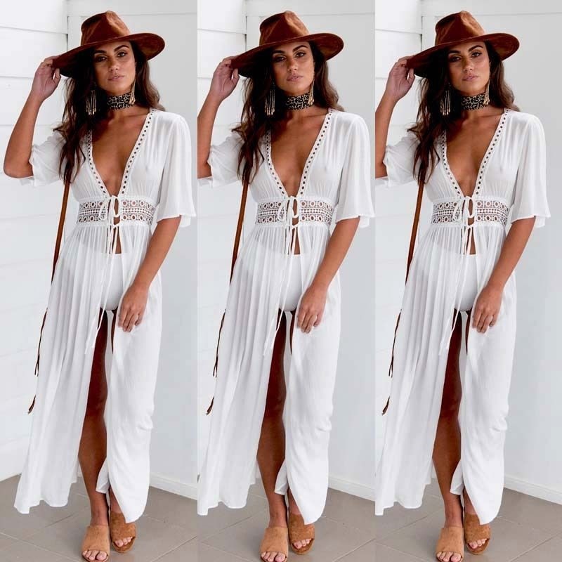 Stijlvolle witte dames tuniek, ideaal als luchtige zomerjurk of strand cover-up voor vakantie.