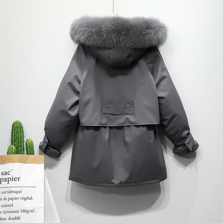 Warme grijze dames buitenjas, luxe thermojas met korte, stijlvolle pasvorm. Elegant.