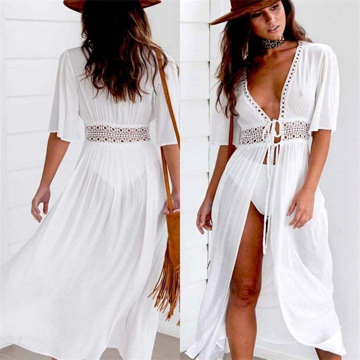 Luchtige dames strandtuniek, stijlvolle witte zomerjurk. Perfect als cover-up voor vakantie en strand.