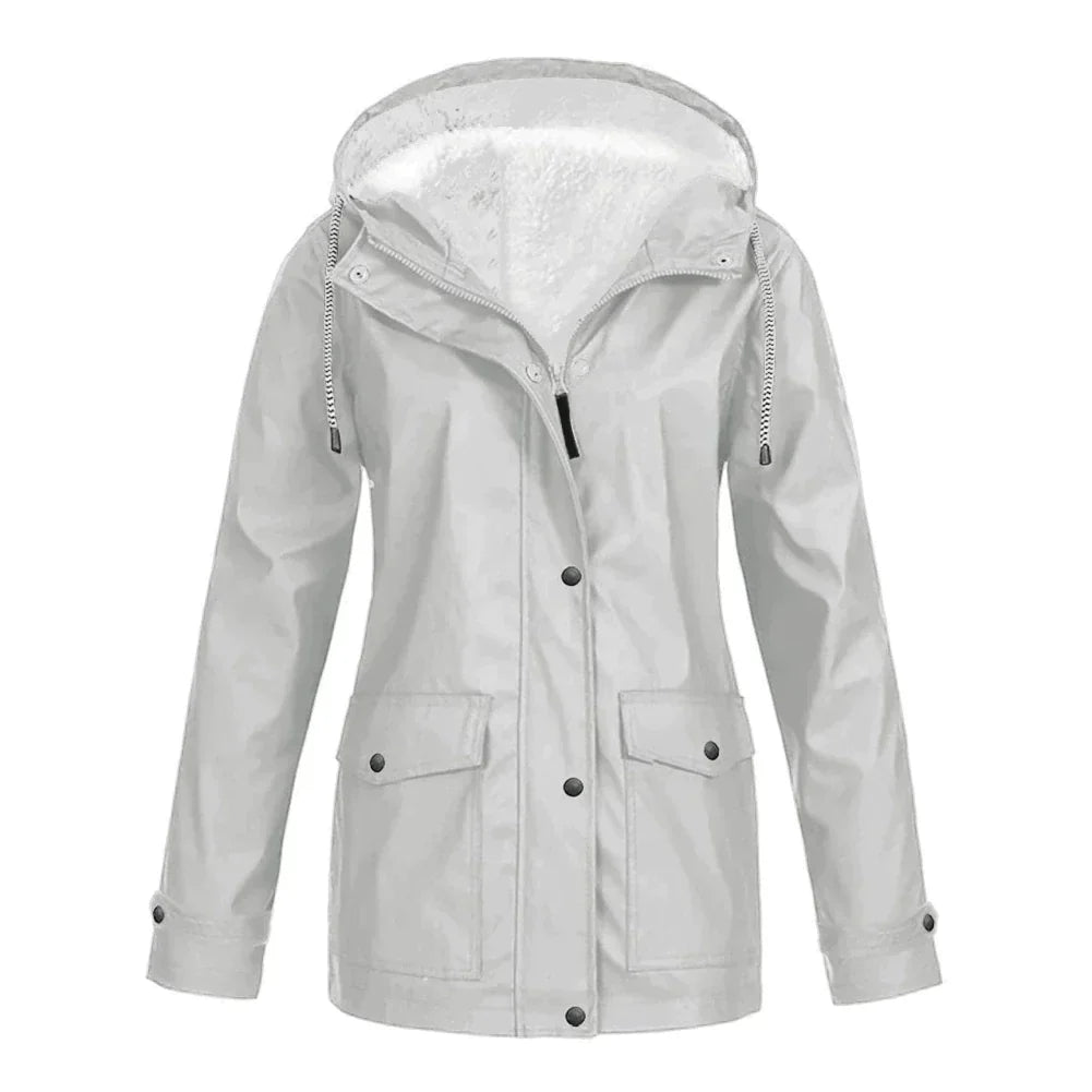 Stijlvolle dames waterdichte jas Faye met praktische capuchon, ideaal voor de herfst en lente.