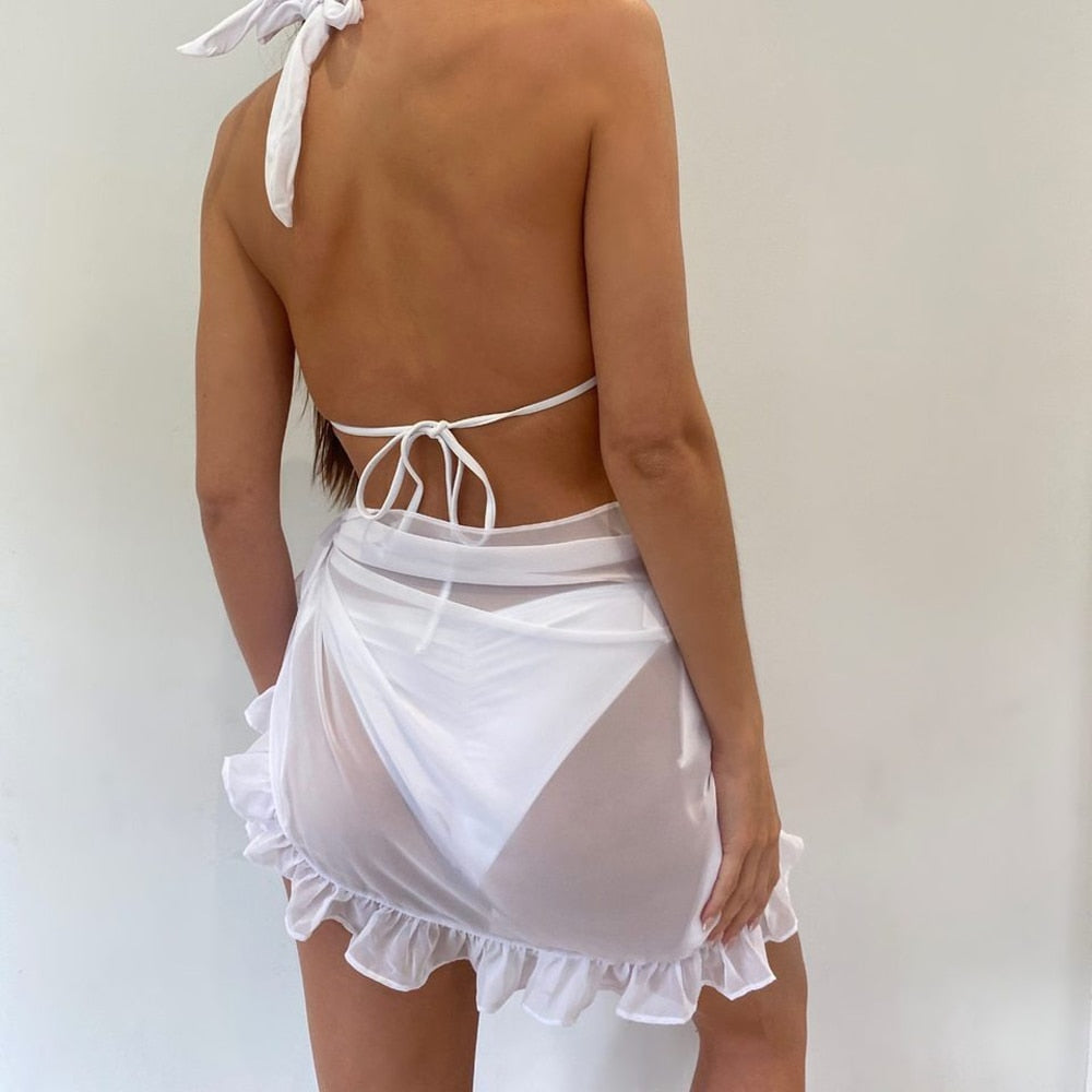 Ademende effen pareo sjaal, essentieel voor dames zwemkleding, biedt snelle bedekking op het strand.