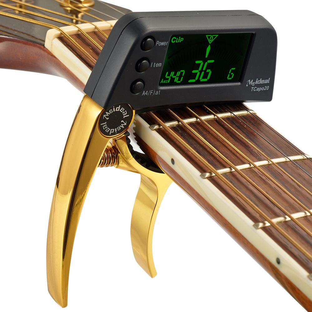 Multifunctionele aluminium gitaar capo en tuner van TuneGrip. Onmisbaar muziekaccessoire voor instrumenten.