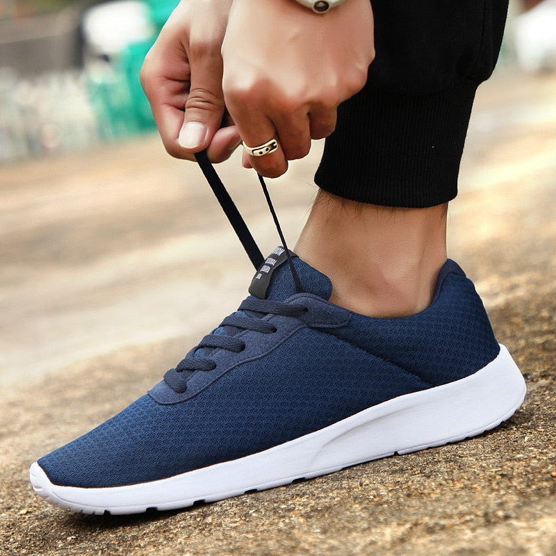Grijze heren casual herfstsneakers, modern en comfortabel, perfect voor de trendy man.