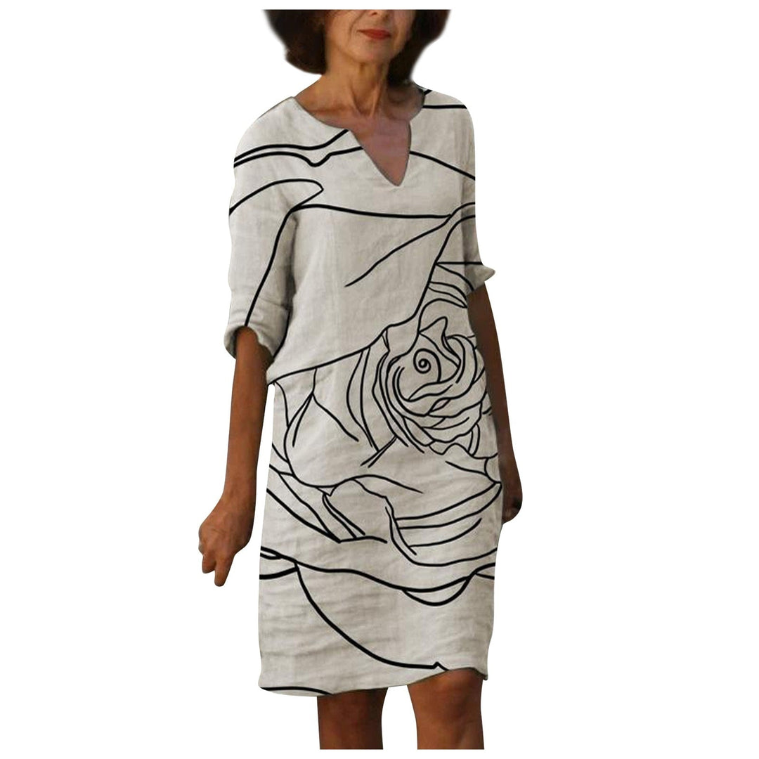 Dames elegante vintage jurk, driekwart mouw, bloemenprint, modieus voor elke gelegenheid.