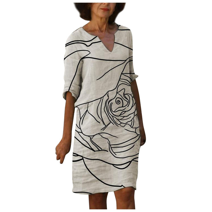 Dames elegante vintage jurk, driekwart mouw, bloemenprint, modieus voor elke gelegenheid.
