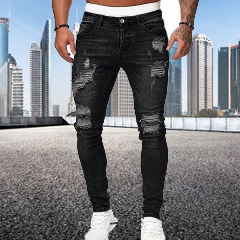 Mannen gedurfde slim fit ripped jeans, een must-have voor een trendy casual urban look.