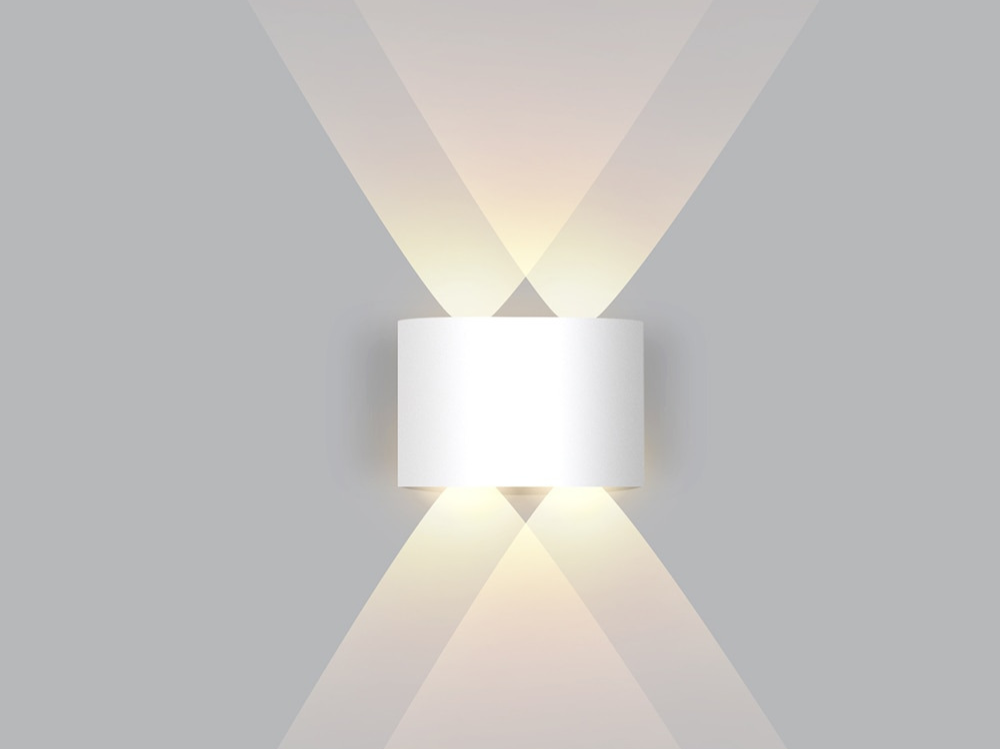 Veelzijdige LED wandlamp, beschikbaar in zwart of wit. Perfecte sfeerverlichting en designlamp voor thuis.