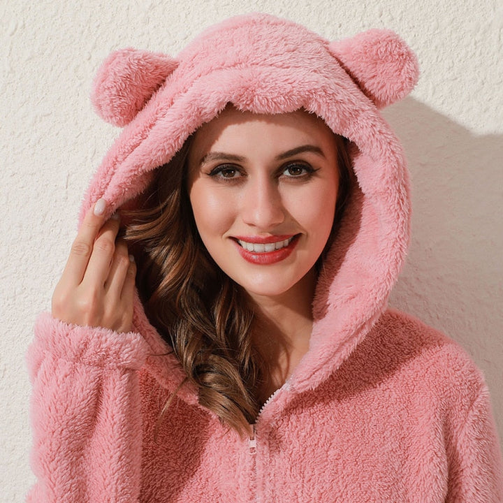 Zwarte winter loungewear jumpsuit dames, perfect voor relaxen met maximale warmte.