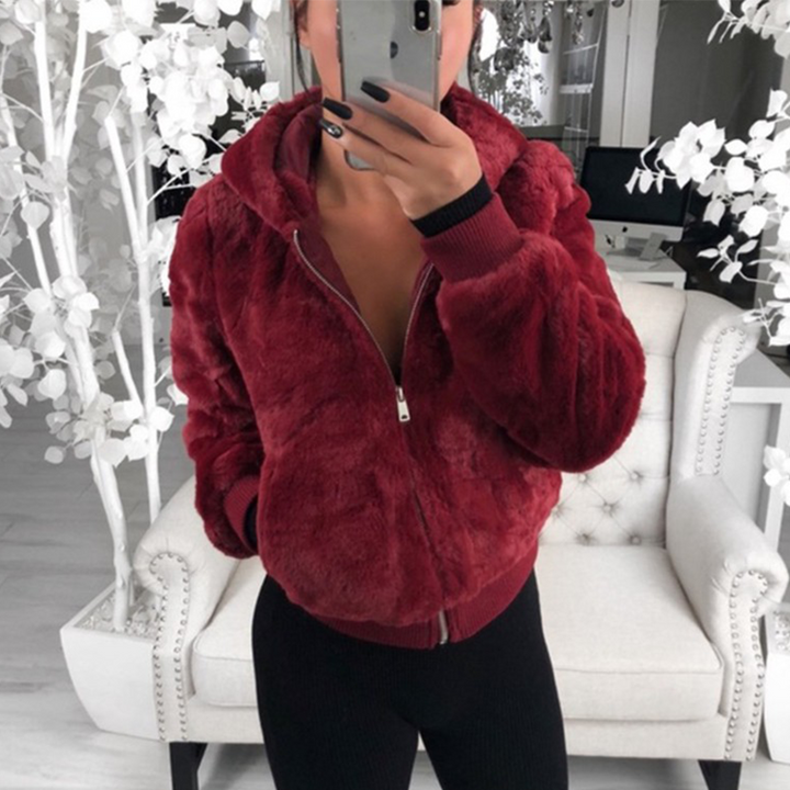 Ultiem zacht damesvest met capuchon, warm en comfortabel voor de wintermaanden.