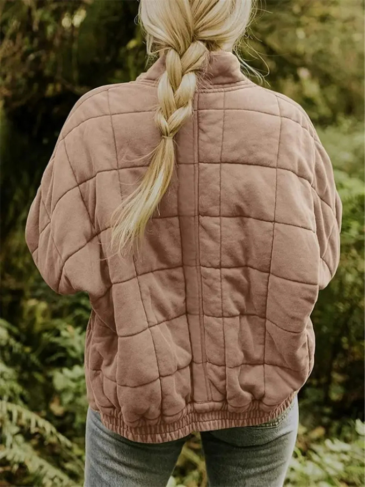 Casual zwarte oversized damesjas, verdikt, met rits en handige steekzakken.