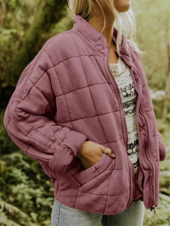 Stijlvolle verdikte overgangsjas voor dames, oversized pasvorm, in elegante grijstint.