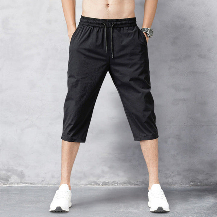 Beige heren 3/4 nylon broek, sneldrogend en lichtgewicht. Perfecte zomerbroek voor wandelen en outdoor.