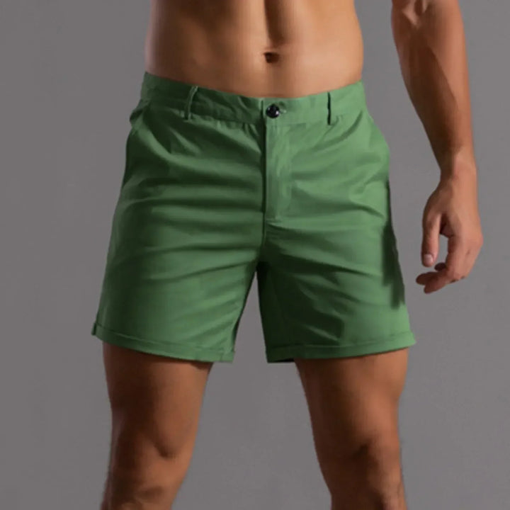 Gedetailleerde close-up van stof en stiksels van heren chino shorts, hoge kwaliteit.