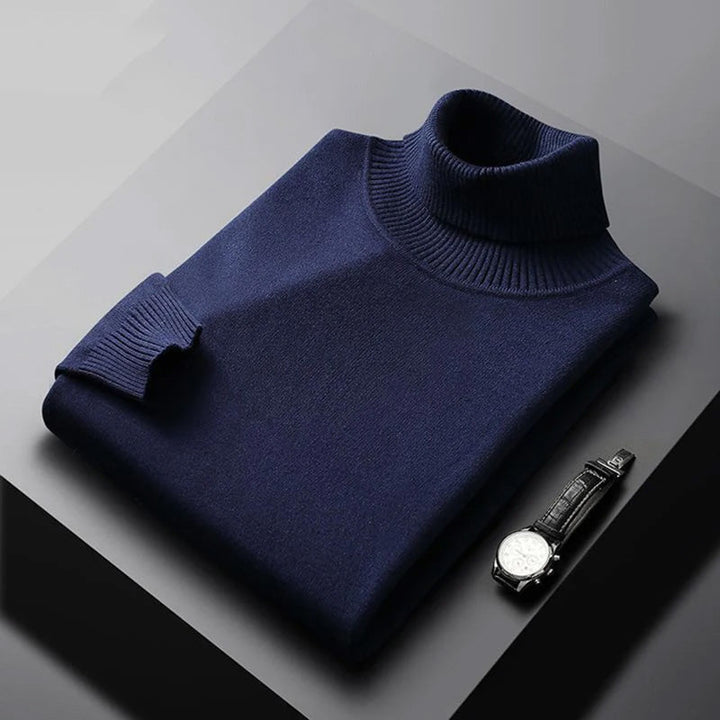 Elegante heren coltrui met verfijnde geribbelde details en colkraag, essentieel voor stijlvolle mannenmode.