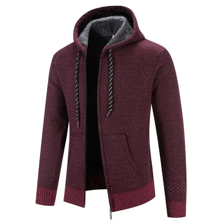 Man draagt een modieuze gebreide heren hoodie met rits, warm gevoerd en comfortabel voor een casual look.
