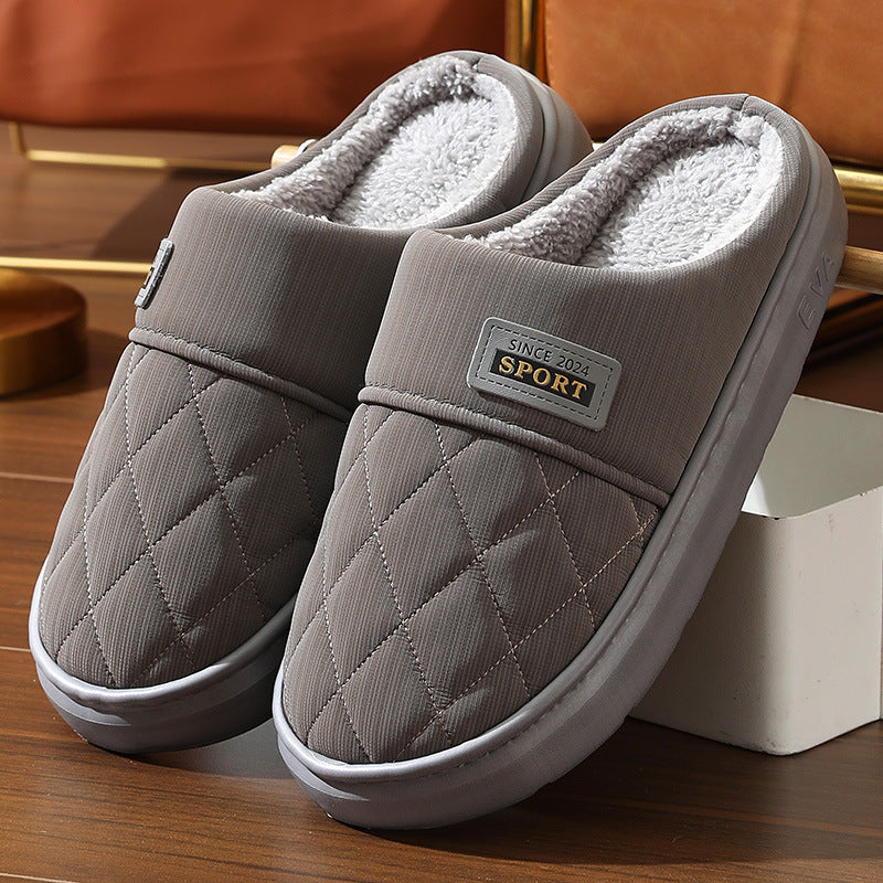 Zachte unisex pantoffels in marineblauw, zorgen voor ultiem comfort en warme voeten binnenhuis.