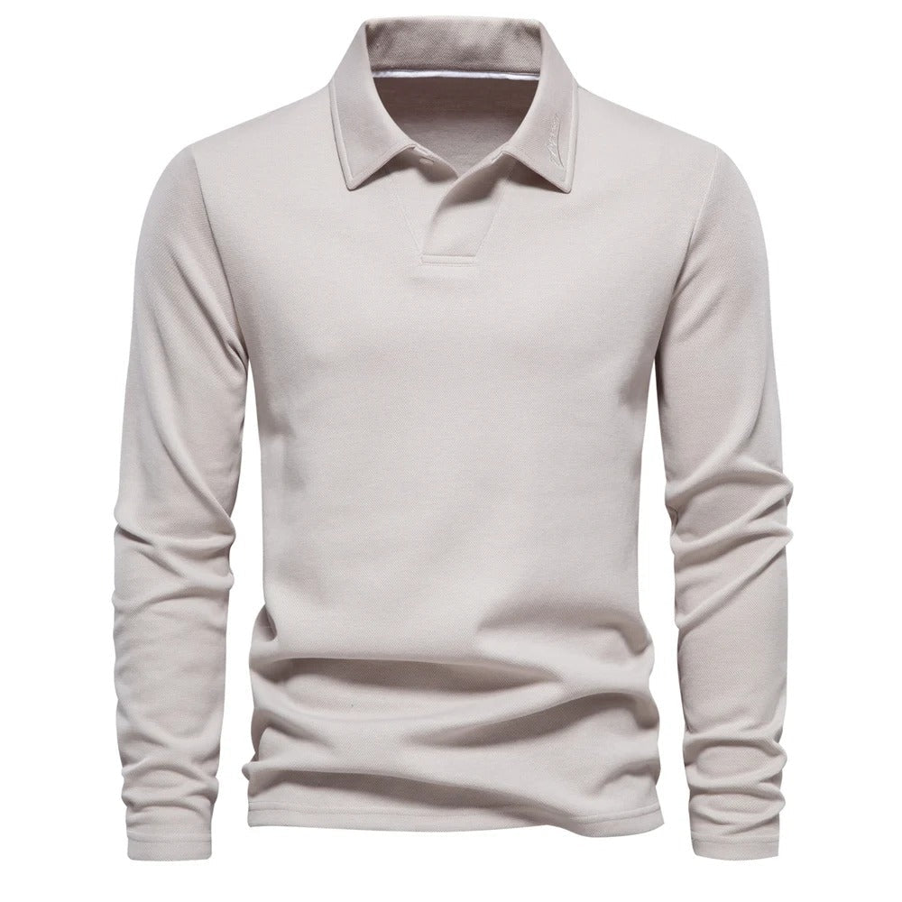 Heren poloshirt met lange mouwen, klassieke kraag, ideaal voor casual en smart-casual herfst/lente looks.