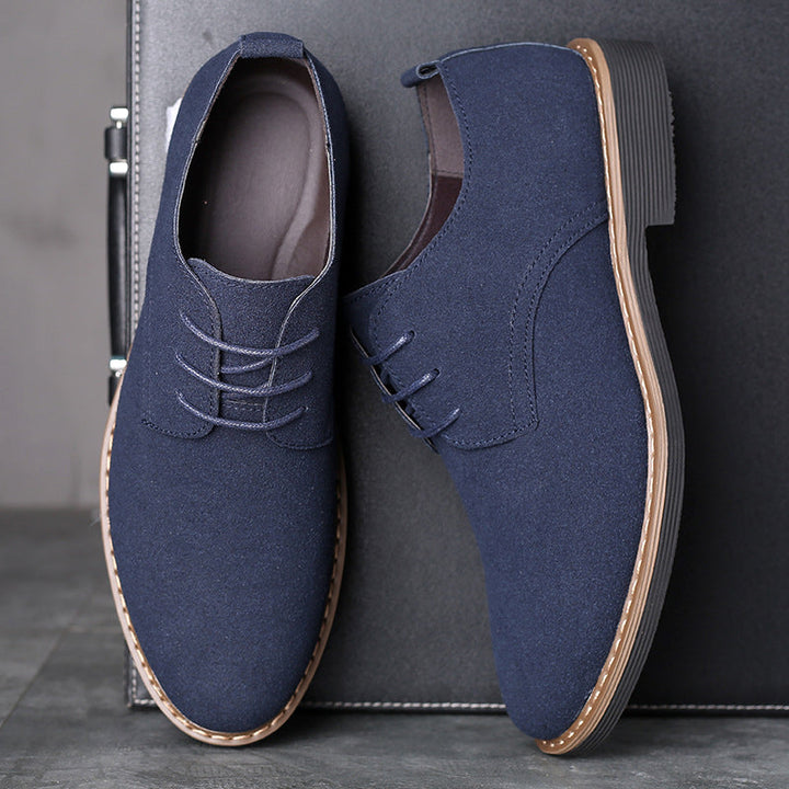 Marineblauwe Oxford schoenen voor heren, veelzijdig en stijlvol, ideaal voor bruiloften en zakelijk gebruik.