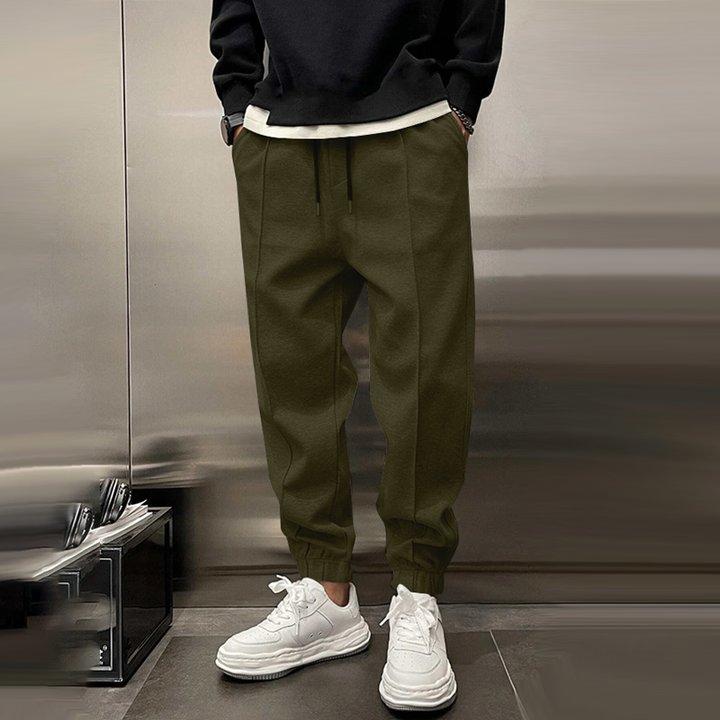 Grijze heren joggingbroek, slim fit en comfortabel, met praktische zakken voor al je essentials.