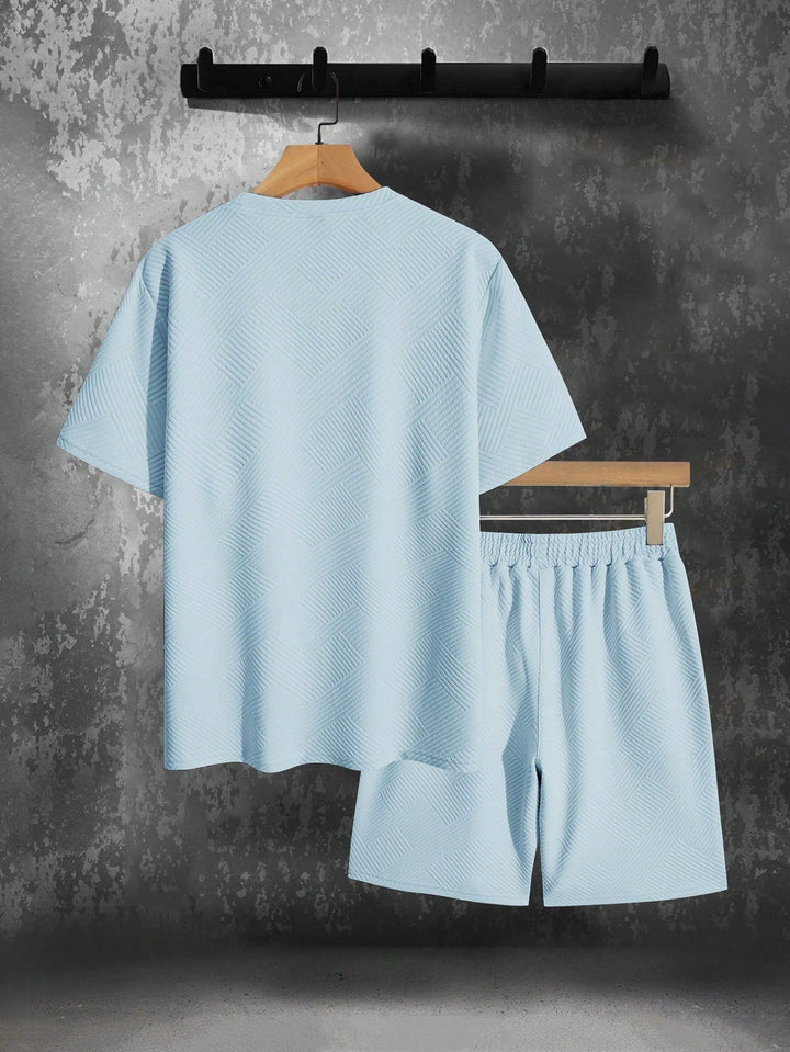 Comfortabele heren sportset met korte mouwen en shorts, perfect voor ontspanning en vrije tijd.