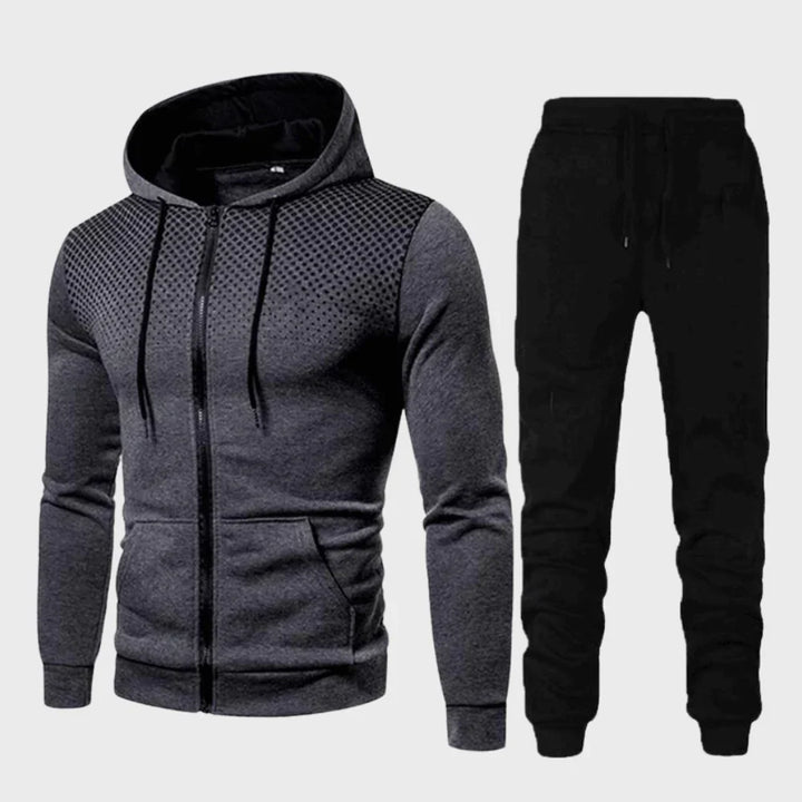 Hoymans PowerTrack heren trainingspak: comfortabel slim fit sportpak met capuchon, ideaal voor sport en vrije tijd.