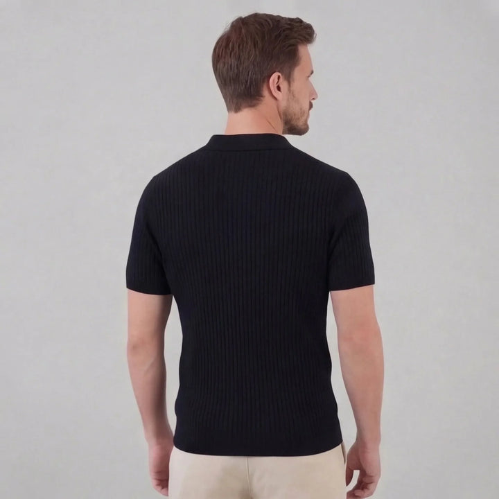 Elegant dames ribgebreid poloshirt met diepe V-hals. Perfecte moderne pasvorm voor elke dag.