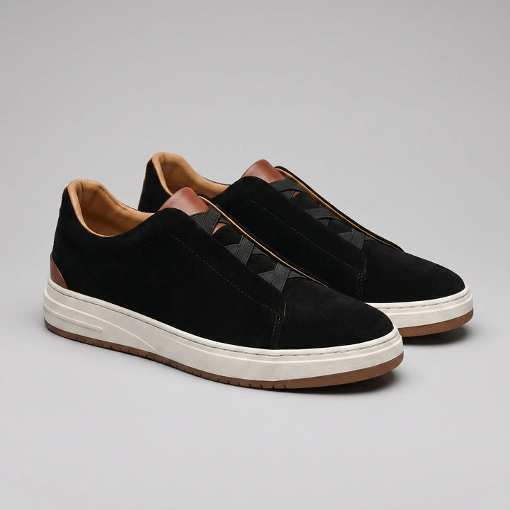 Zwarte heren slip-on sneakers voor dagelijks comfort, ideaal als casual instappers.