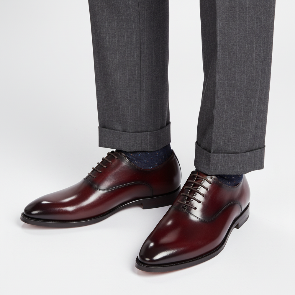 Elegante bruine lederen herenschoenen, comfortabel en stijlvol voor een zakelijke of feestelijke outfit.