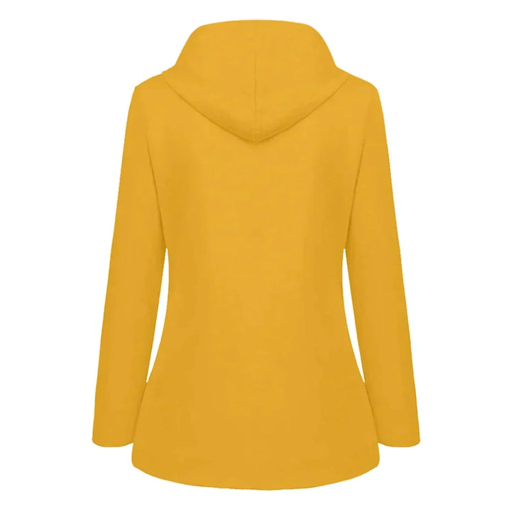 Duurzame waterdichte jas Faye voor dames, combineert functionaliteit met moderne regenstijl.