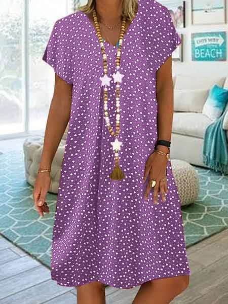 Modieuze Boheemse maxidress met V-hals, ideaal als strandjurk of zomerse dameskleding.