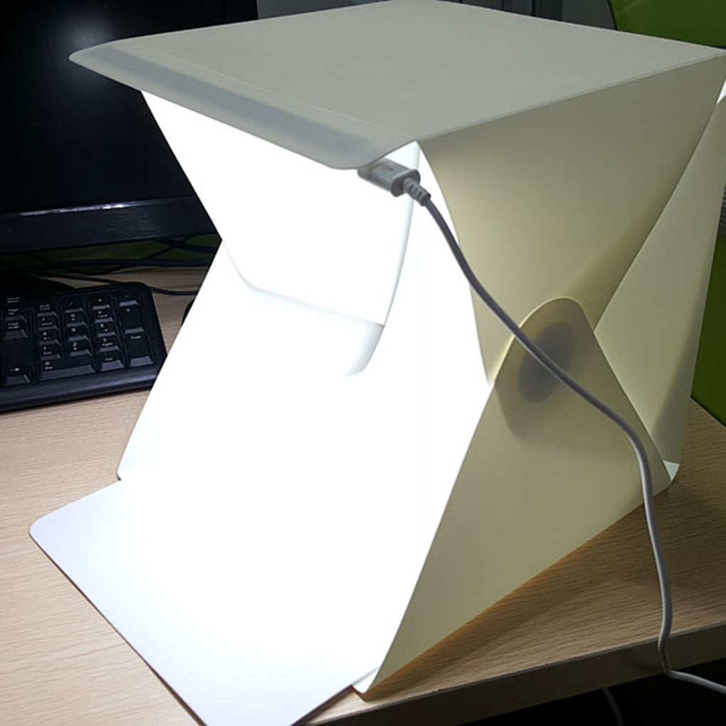 Maak verbluffende productfoto's met de draagbare GlowBox lichtbox, essentieel voor e-commerce en webshops.