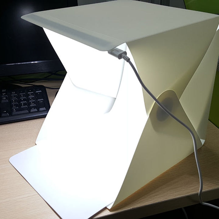 Maak verbluffende productfoto's met de draagbare GlowBox lichtbox, essentieel voor e-commerce en webshops.