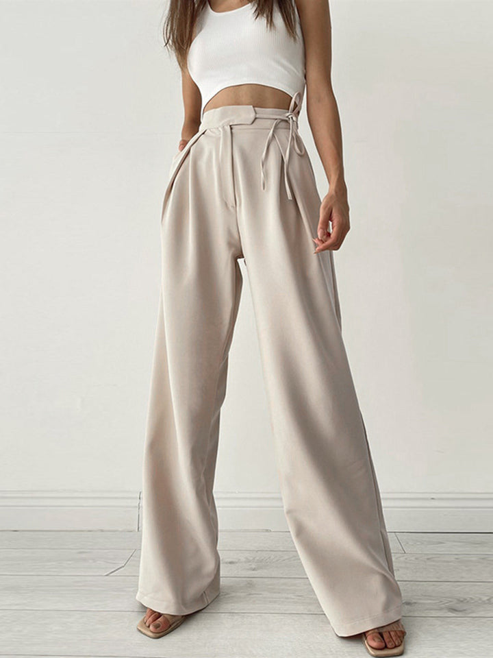 Dames high waist pantalon met wijde pijpen en elegante taille strik, ideaal voor een moderne look.