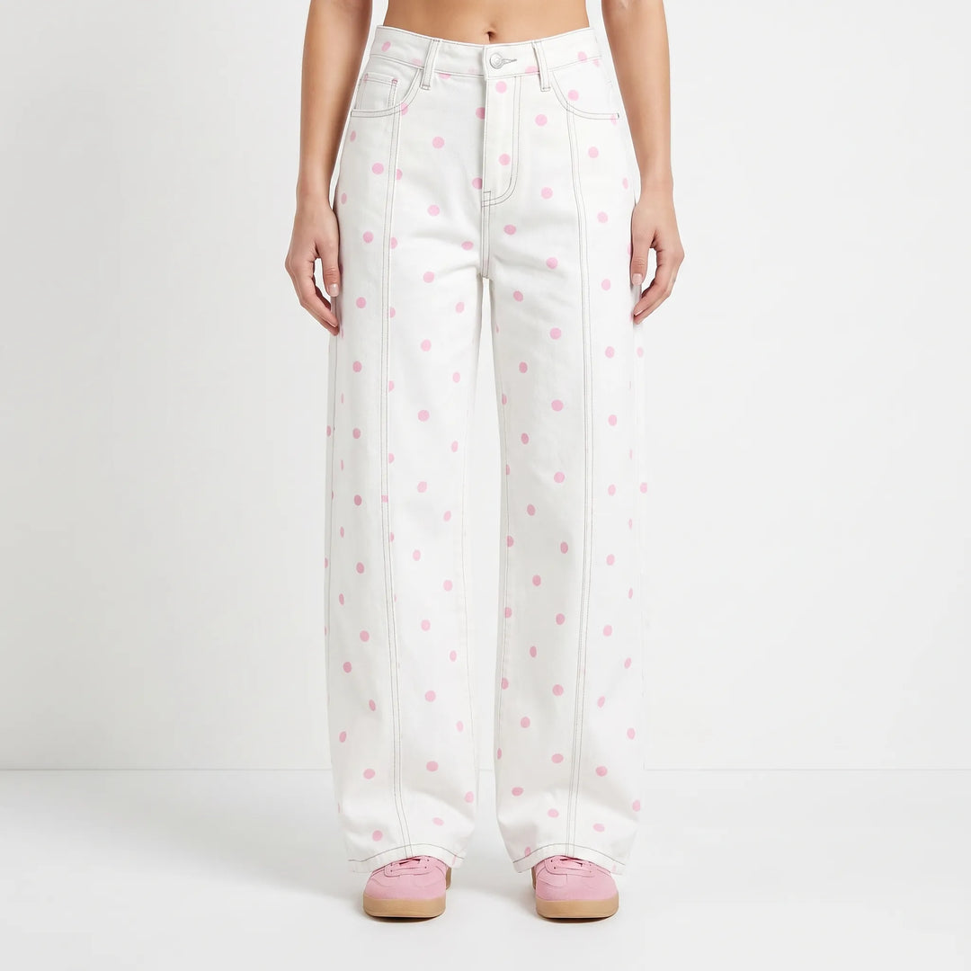 Modieuze dames barrelbroek met stippenprint, high-waist pasvorm en wijde pijpen, een trendy toevoeging.
