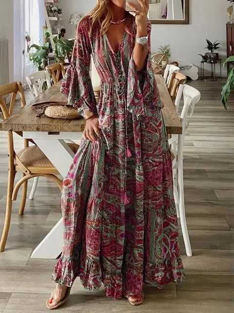 Zomerse dames maxi jurk, bohemian stijl, met frisse bloemenprint en wijde mouwen; perfecte strandjurk.