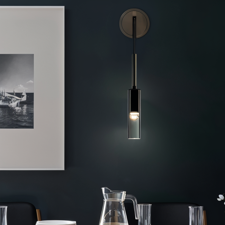 Chique Orvane wandlamp met uniek rookglas effect, minimalistisch design voor exclusieve sfeerverlichting.