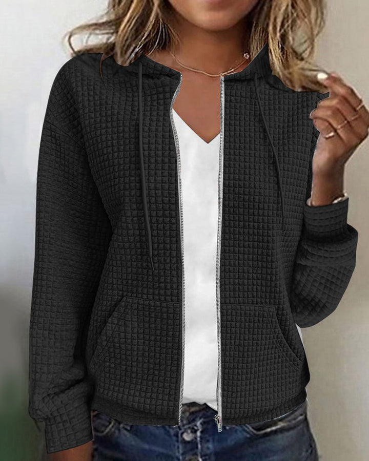 Zacht damesvest met capuchon, rits en zakken, perfecte losse pasvorm voor casual én stijlvolle mode.
