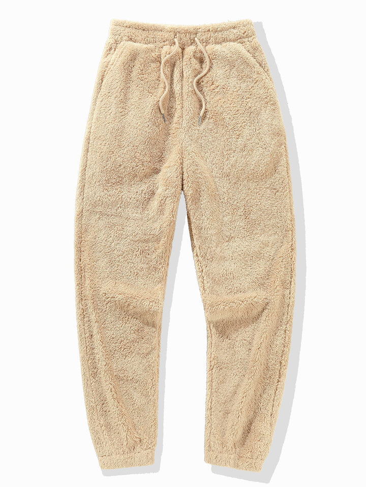 Ideale herfst/winter loungeset: comfortabele unisex fleece hoodie en jogger voor koude dagen thuis.
