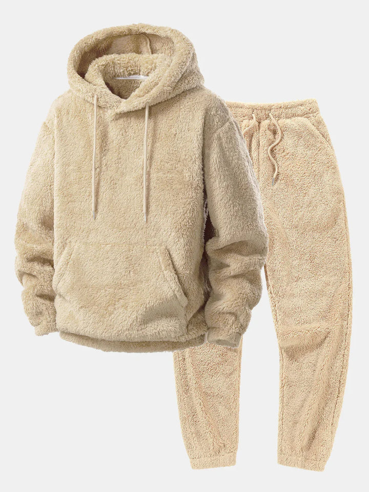 Unisex fleece loungeset met comfortabele hoodie en jogger, perfect voor ontspanning in herfst en winter.