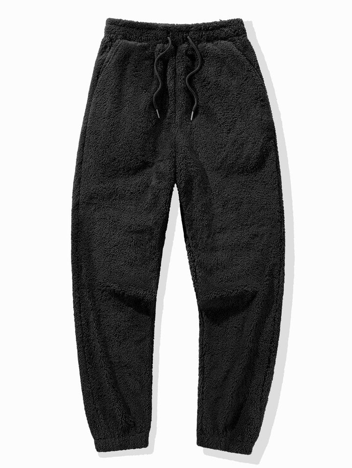 Modieuze en comfortabele unisex loungeset met zachte fleece hoodie en bijpassende jogger.