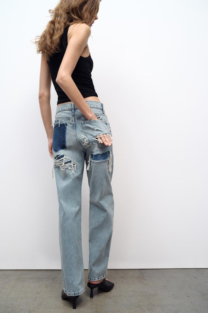 Comfortabele dames wideleg jeans met een trendy, beschadigde afwerking voor een relaxte stijl.
