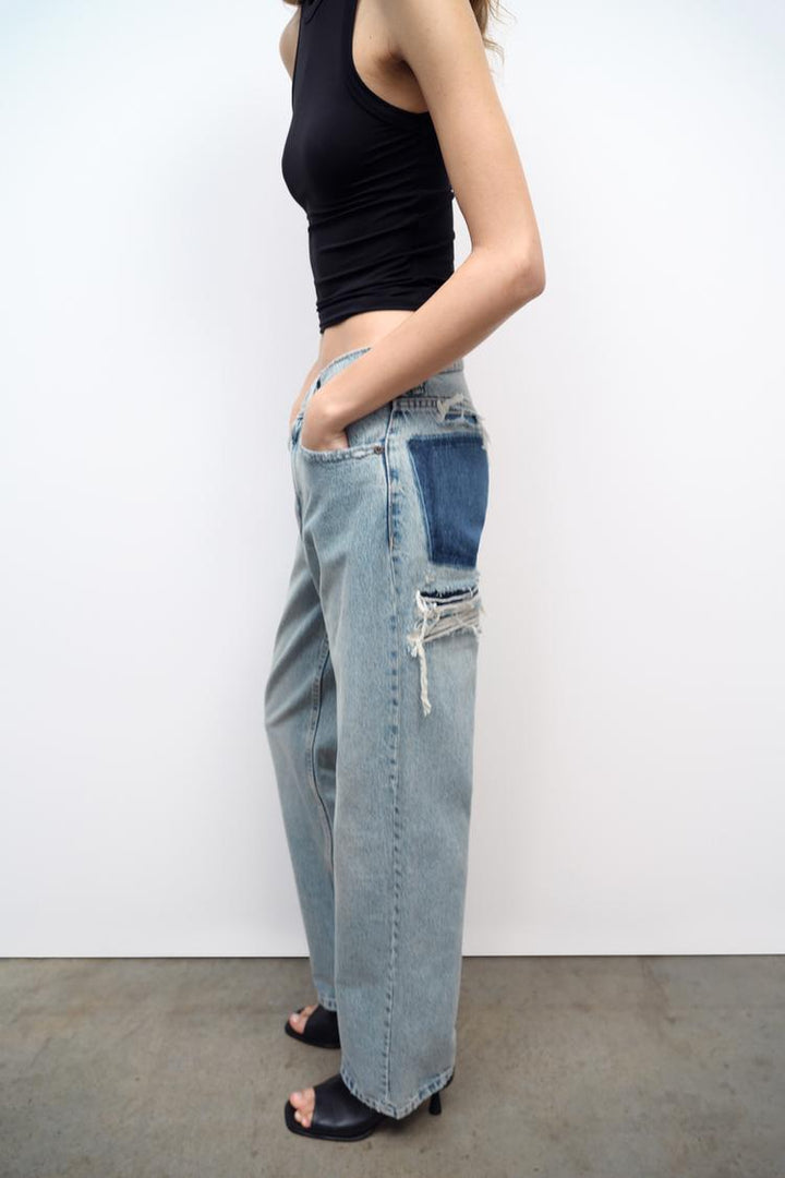 Modieuze dames wideleg jeans met hippe ripped details, perfect voor lente en zomer fashion.