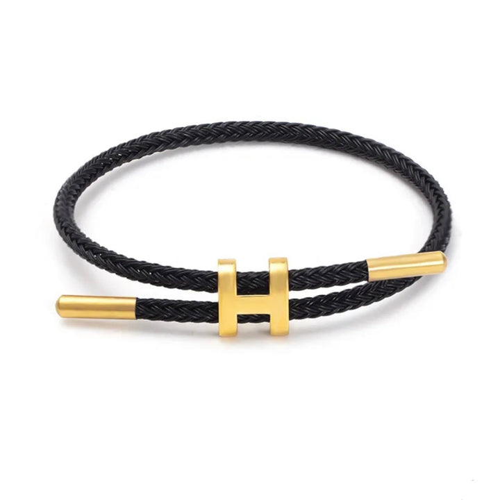 Unisex gevlochten touw armband met stijlvolle H-sluiting; modern en elegant sieraad.