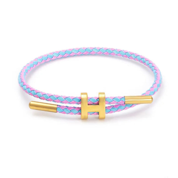 Unisex touw armband, fijn gevlochten design met opvallende H-sluiting; een veelzijdig sieraad.