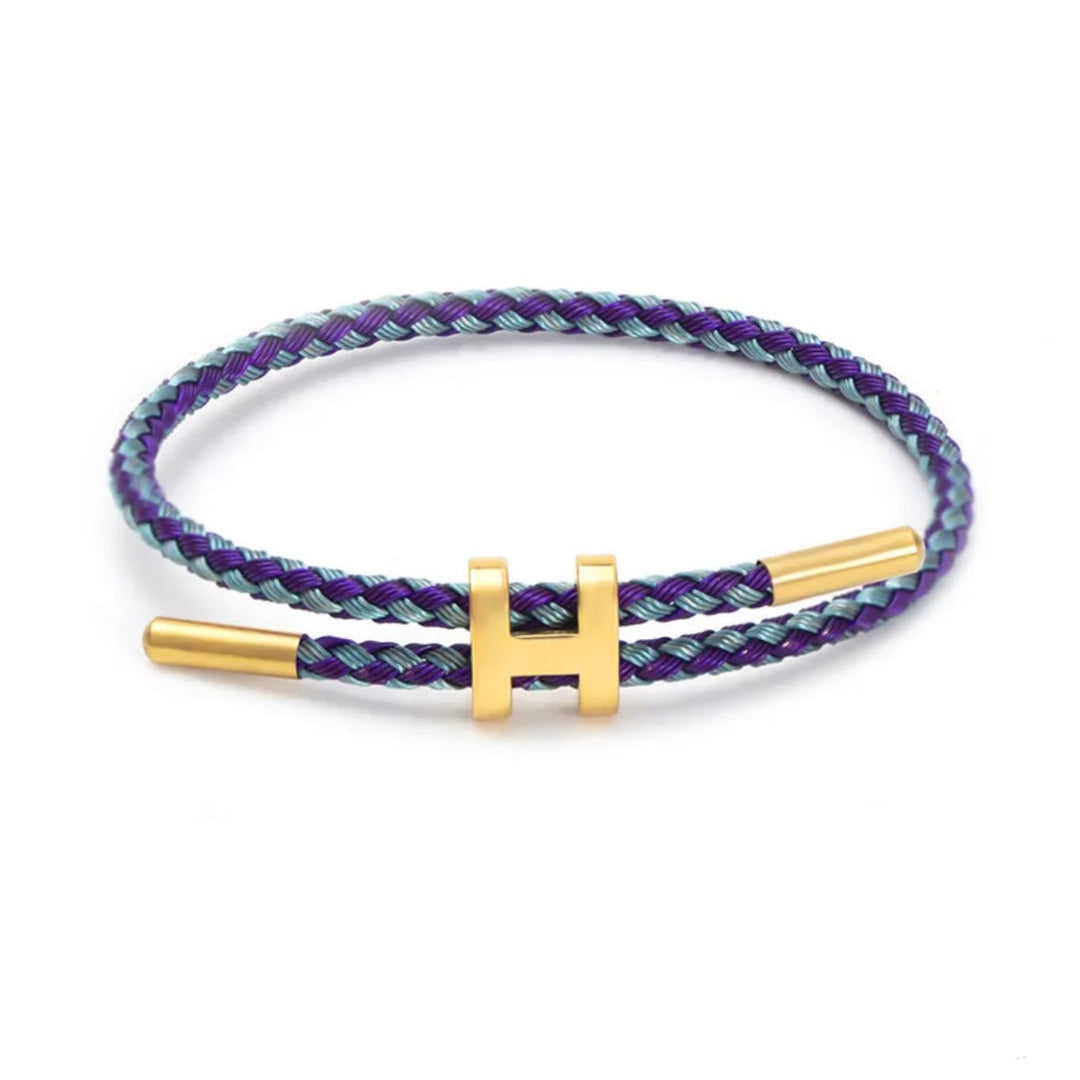 Gevlochten touw armband in diverse kleuren, elegant afgewerkt met een moderne H-sluiting, unisex.