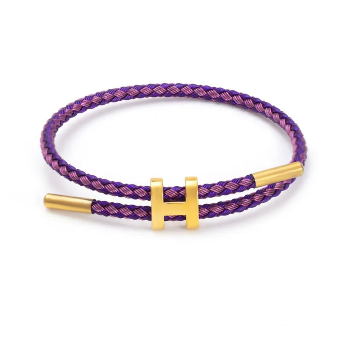 Accessoire voor elke outfit: unisex gevlochten touw armband met strakke H-sluiting.