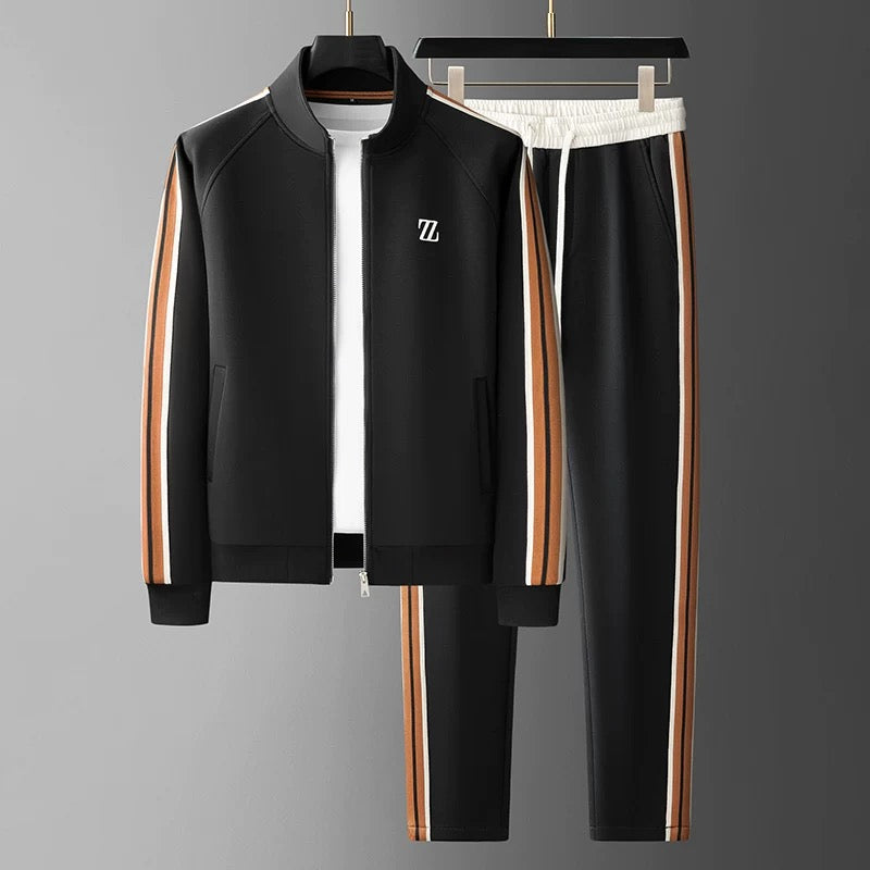 Compleet heren trainingspak, bestaande uit jasje en broek, voor een gecoördineerde athleisure outfit.